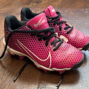 Nike Kids Black and Pink softball cleats.